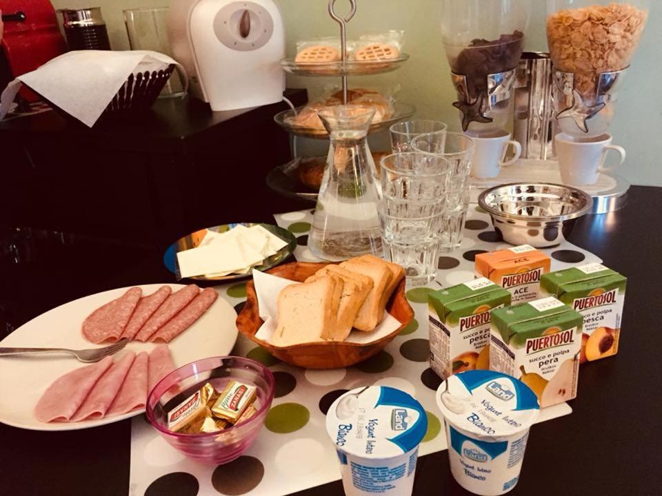 Alexander Acomodação com café da manhã 